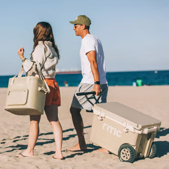 People taking coolers to the beach